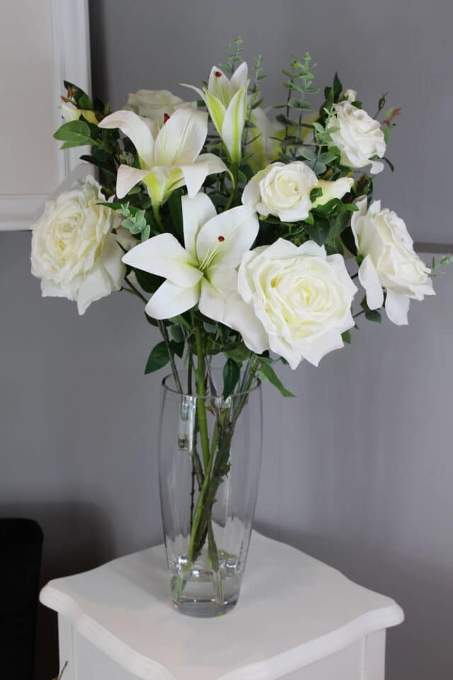 artificial rose and lily arrangement