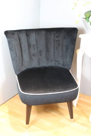 black wingbacked armchair