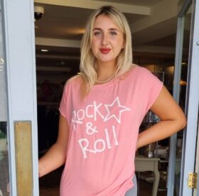 a postcard from brighton pink rock and roll tee